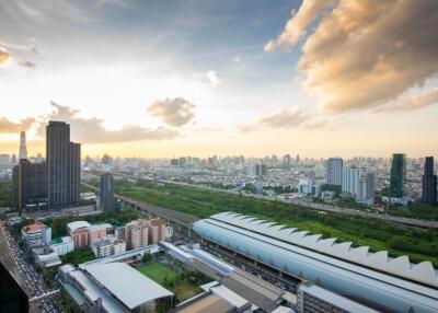 Panoramic view of the city with high-rise buildings and green areas