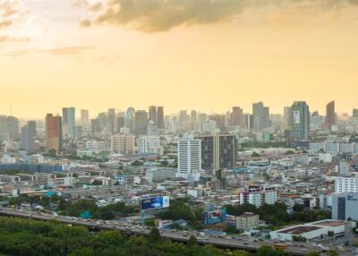 Panoramic view of city skyline at sunset