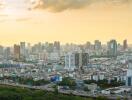 Panoramic view of city skyline at sunset