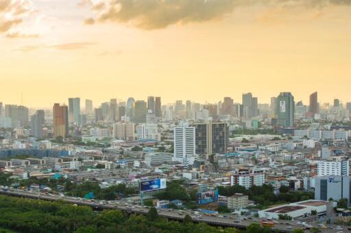 Panoramic view of city skyline at sunset