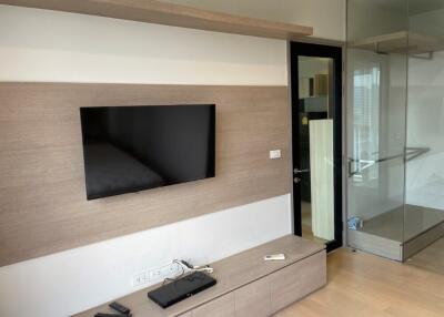 Modern living area with TV and entertainment setup