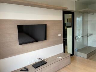 Modern living area with TV and entertainment setup