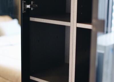 Open closet with shelves in a bedroom