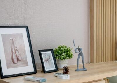 Wooden console table with decor items