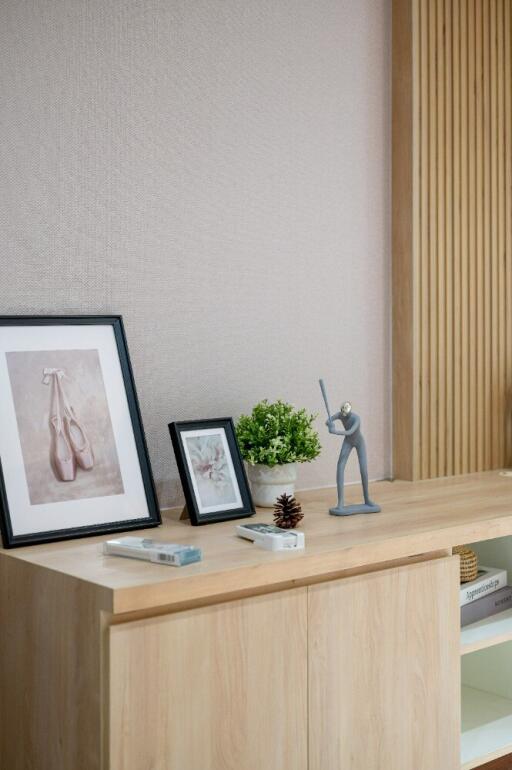 Wooden console table with decor items