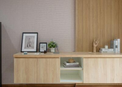 Modern living room with wooden cabinets and air conditioner