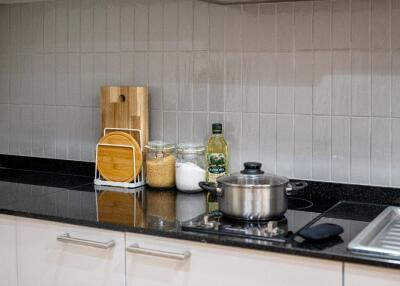 Modern kitchen countertop with cooking essentials and stove