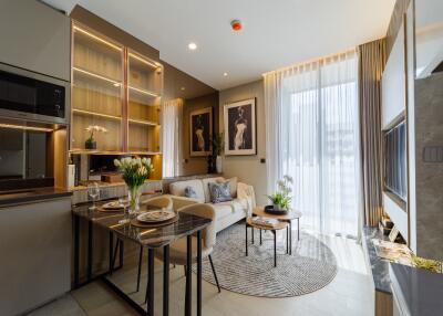 Modern living room with dining area and large windows