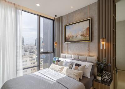 Modern bedroom with a view of the city