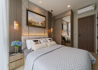 Cozy, modern bedroom with elegant decor and soft lighting