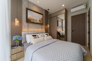 Cozy, modern bedroom with elegant decor and soft lighting