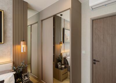 Modern bedroom with mirrored wardrobe and stylish decor