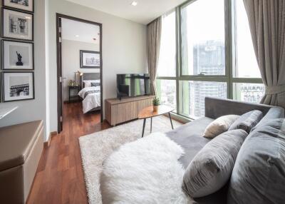 Modern living room with large windows and a view