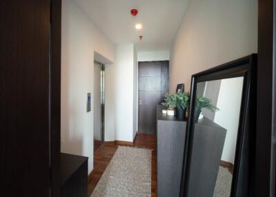 Modern hallway with elevator and mirror