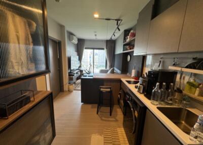 Modern kitchen with view of living area