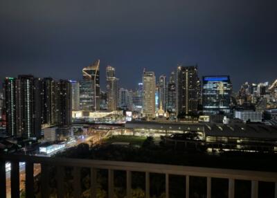 Night view of city skyline with illuminated buildings