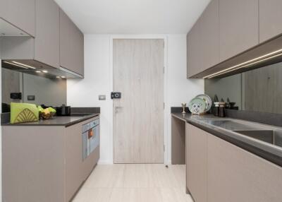 Modern kitchen with sleek cabinets and appliances