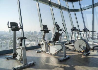 Modern fitness center with city views