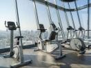 Modern fitness center with city views