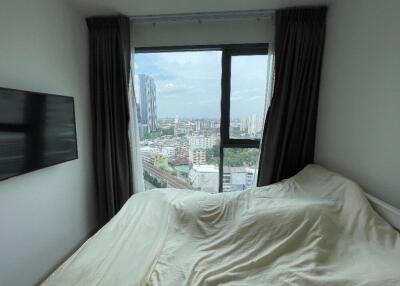 Bedroom with a city view