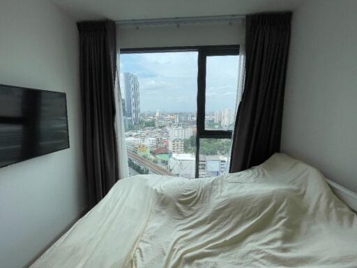 Bedroom with a city view