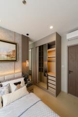 Bedroom with modern decor and built-in wardrobe