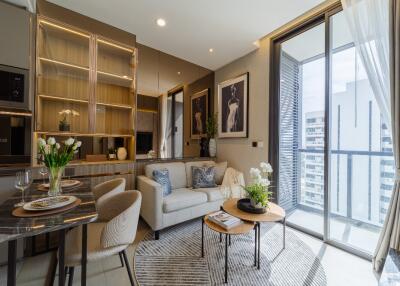 Modern living room with dining area and large windows