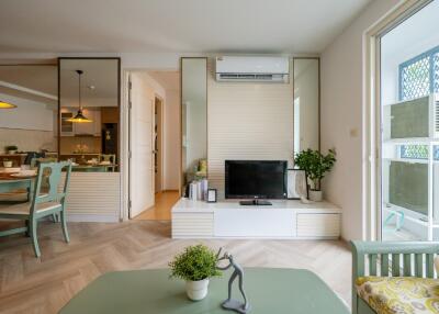 Modern living room with integrated dining area