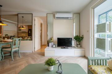 Modern living room with integrated dining area