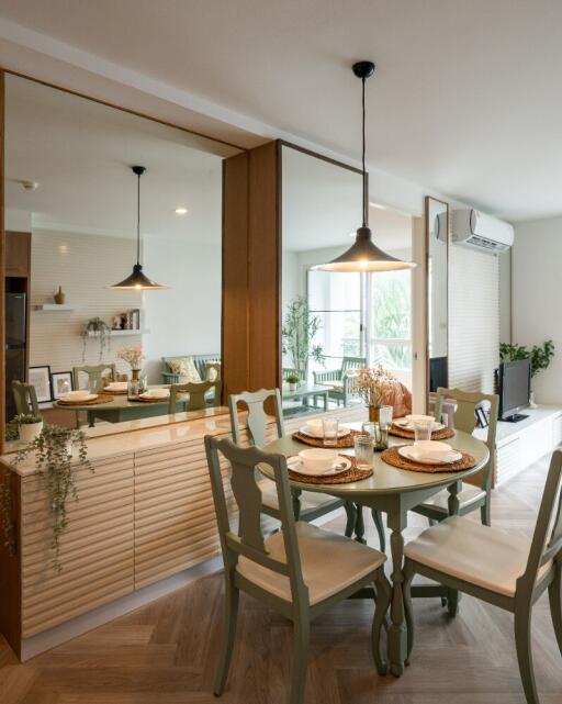 Modern dining area with round table and chairs