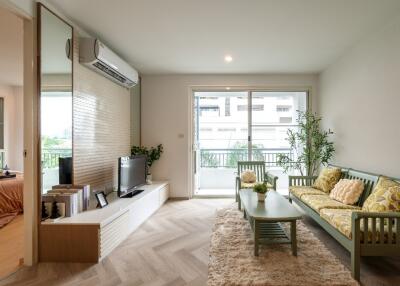 Modern living room with a view of the balcony