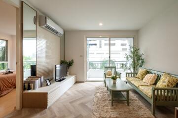 Modern living room with a view of the balcony