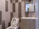 Modern bathroom with tiled walls and a toilet