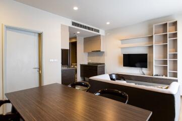 Modern living room with integrated dining area