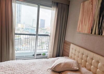 Cozy bedroom with city view