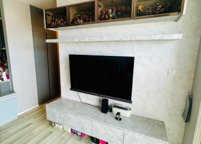 Modern living room with TV and decorative items