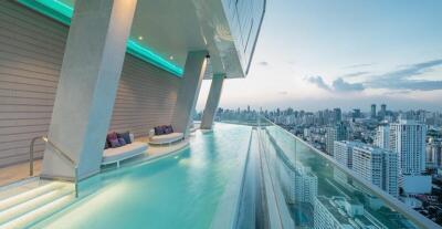 Infinity pool with city skyline view