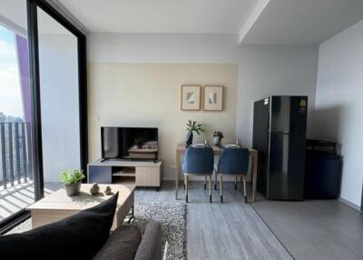 Modern living and dining area with balcony view