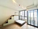 modern living area with large windows and mezzanine bed