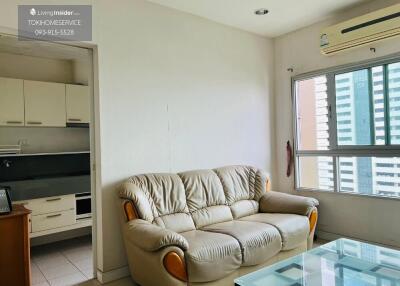 Living room with sofa and window view