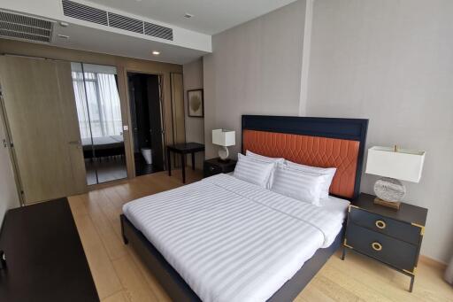 Spacious bedroom with modern decor and ensuite bathroom