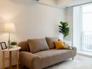 Comfortable living room with sofa and indoor plant