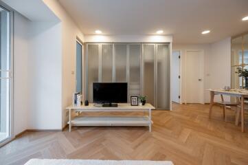 Spacious living room with TV and contemporary decor