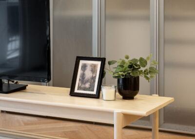 Modern living room with a TV and a coffee table