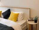 Cozy bedroom with gray and yellow cushions