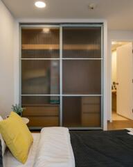 Modern bedroom with sliding closet doors