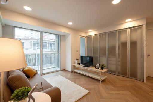 modern living room with large window and sliding doors