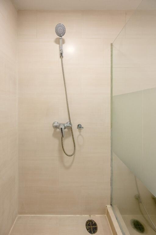 Shower area with sleek fixtures