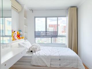 Bright and cozy bedroom with window view