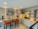 Modern living room with orange chairs and wooden accents